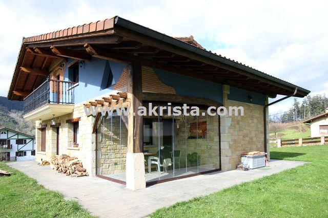 Cortinas de cristal en caserios