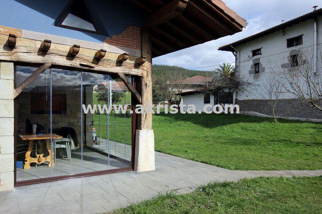 Cortinas de cristal en caserios