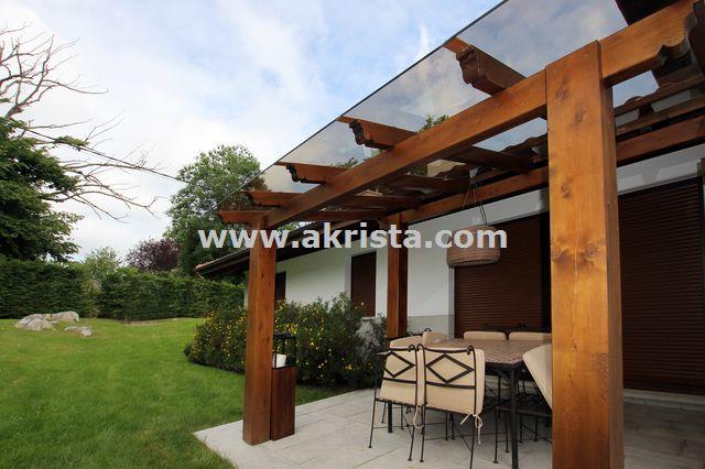 Porches de madera con techo de cristal